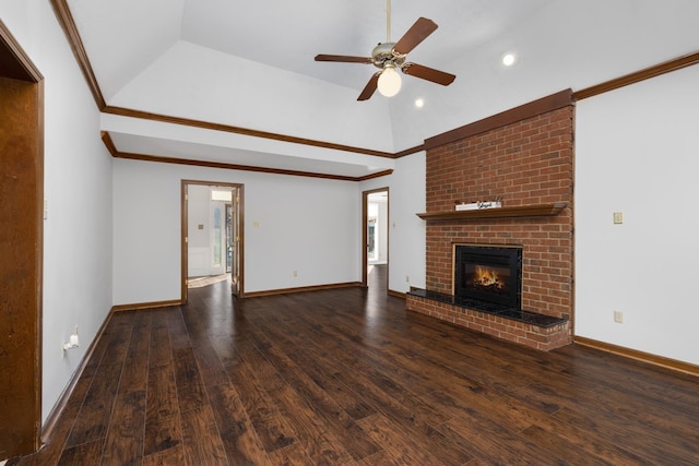 unfurnished living room featuring a fireplace, lofted ceiling, ceiling fan, ornamental molding, and dark hardwood / wood-style floors