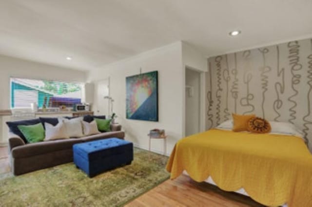 bedroom featuring wood-type flooring