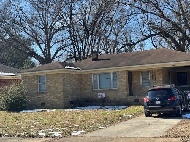 view of front of house with a carport