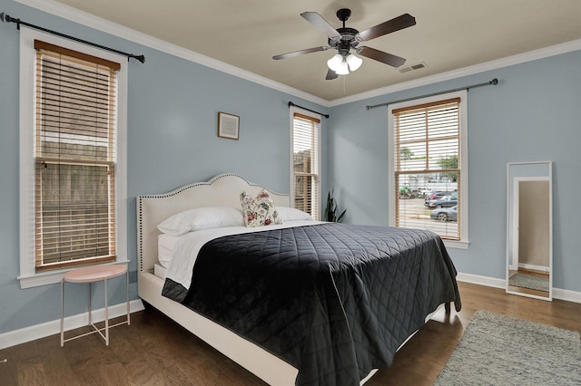 bedroom with dark wood-type flooring, ceiling fan, and crown molding