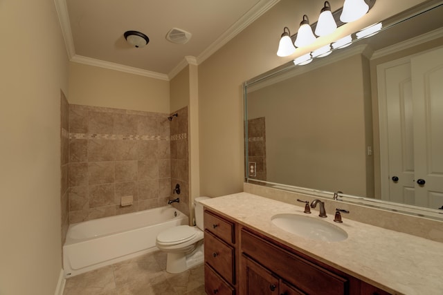 full bathroom featuring toilet, tile patterned floors, ornamental molding, tiled shower / bath, and vanity