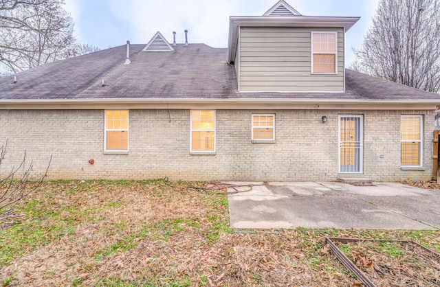 rear view of house with a patio