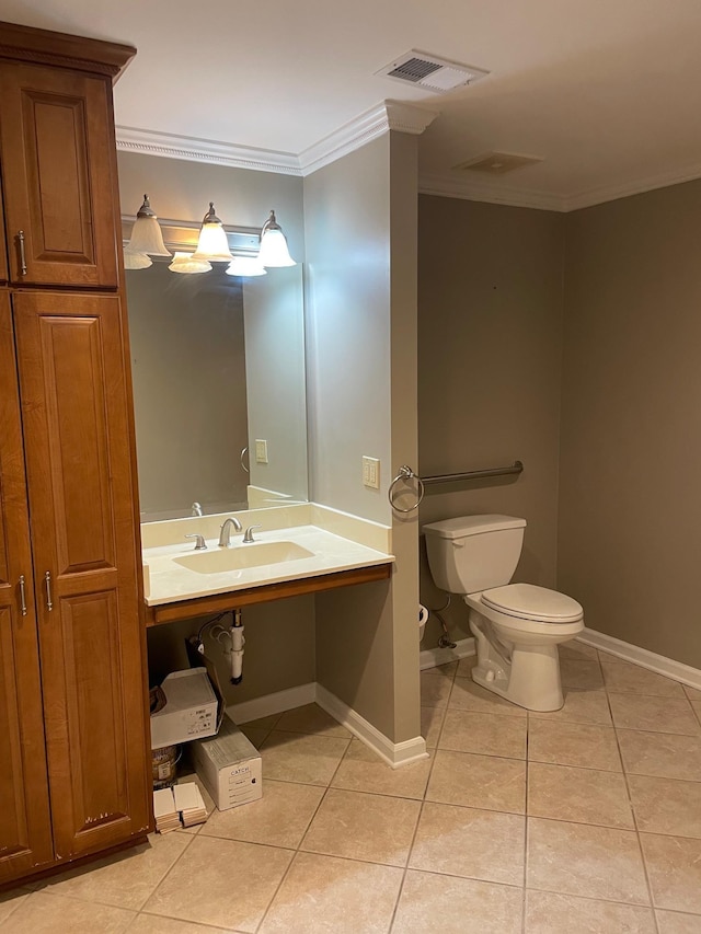 bathroom with sink, ornamental molding, toilet, and tile patterned flooring