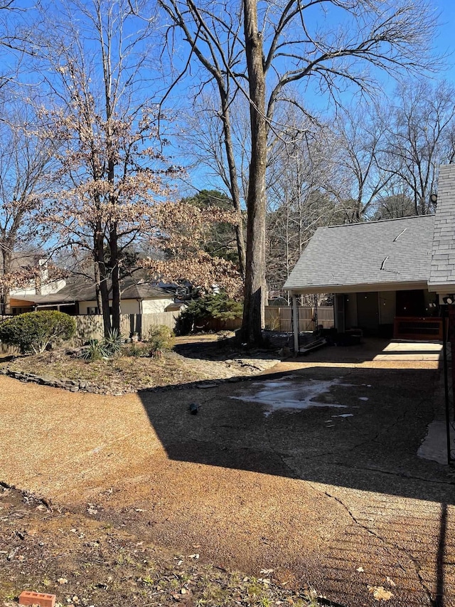 view of yard featuring a carport