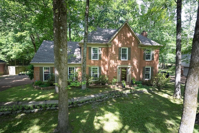 colonial house with a front lawn