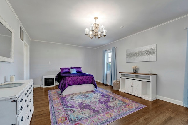 bedroom featuring ornamental molding, a notable chandelier, and dark wood-type flooring