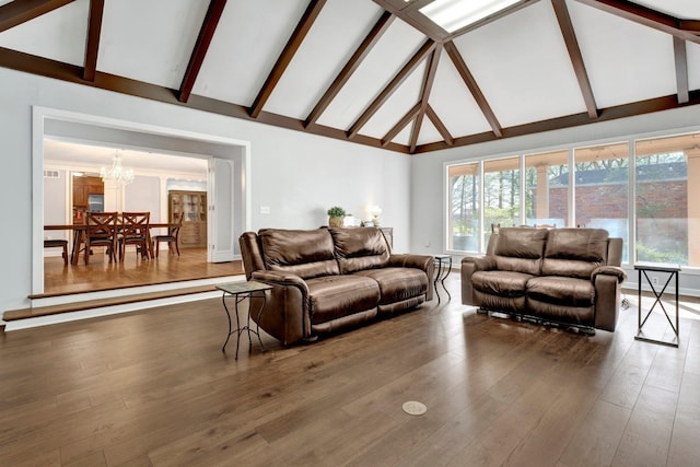 living room with high vaulted ceiling, dark hardwood / wood-style floors, beamed ceiling, and an inviting chandelier