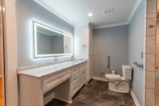 bathroom featuring toilet, vanity, a textured ceiling, and ornamental molding