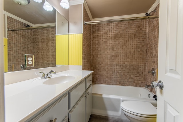 full bathroom with toilet, crown molding, shower / washtub combination, and vanity