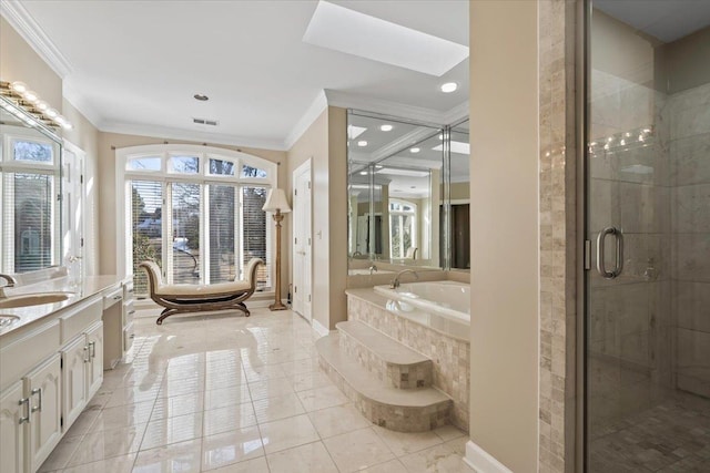 bathroom featuring tile patterned flooring, a skylight, ornamental molding, independent shower and bath, and vanity