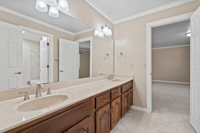 bathroom with crown molding and vanity