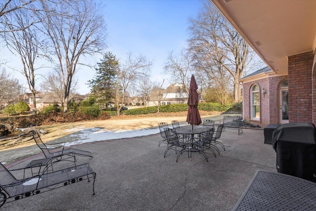 view of patio with a grill