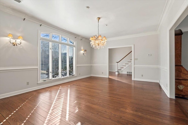 unfurnished dining area with a notable chandelier, ornamental molding, and dark hardwood / wood-style flooring