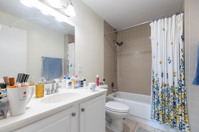 full bathroom featuring vanity, shower / tub combo with curtain, tile patterned floors, and toilet