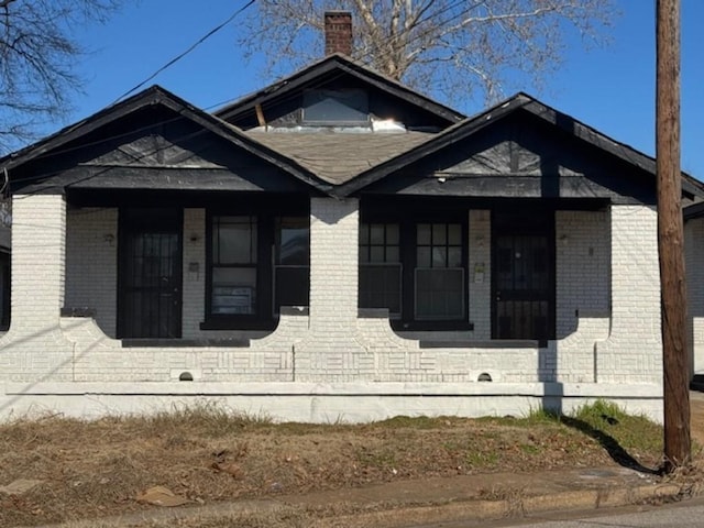 view of property exterior featuring covered porch