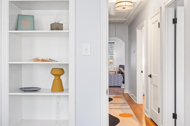 corridor featuring light hardwood / wood-style flooring