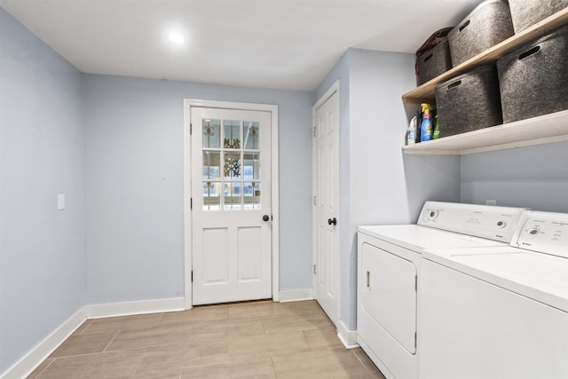 laundry room featuring separate washer and dryer