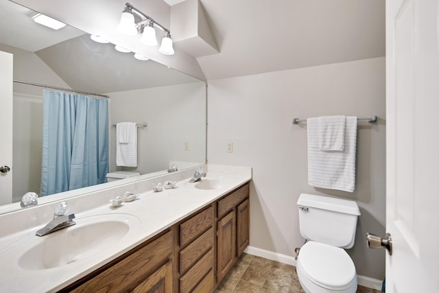 bathroom with toilet, lofted ceiling, walk in shower, and vanity