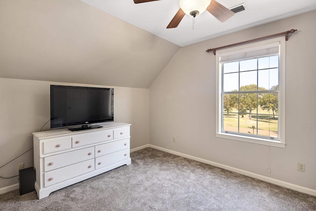 bonus room featuring ceiling fan, light carpet, and vaulted ceiling