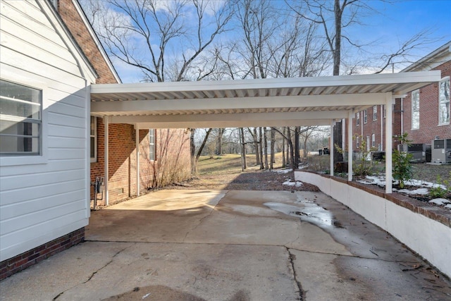 view of patio featuring a carport