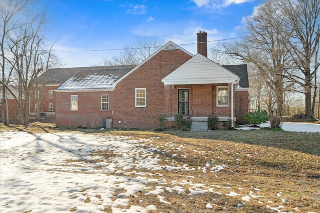 view of front of home featuring central air condition unit