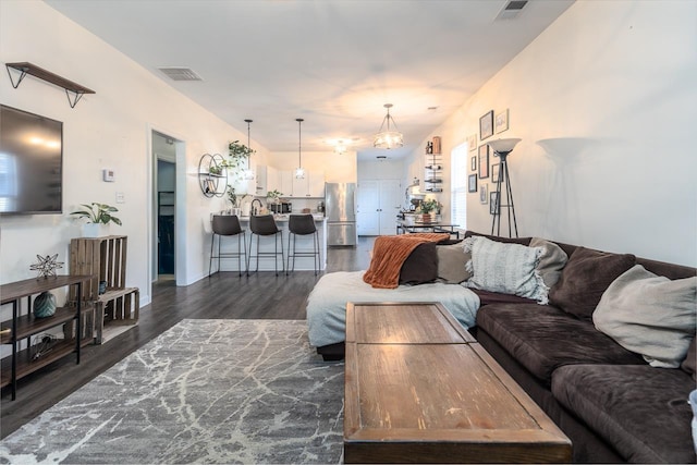 living room featuring dark hardwood / wood-style floors