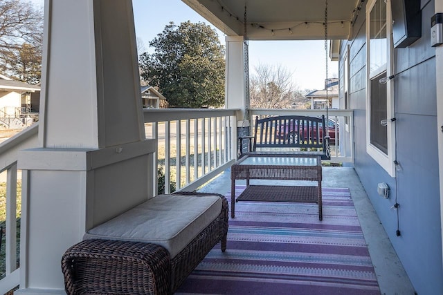 balcony featuring covered porch