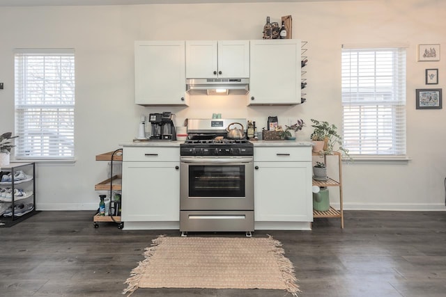 kitchen featuring white cabinets, dark wood-type flooring, and stainless steel range with gas stovetop