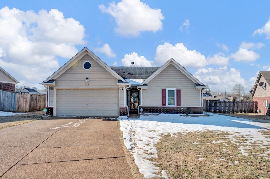 view of front of home with a garage