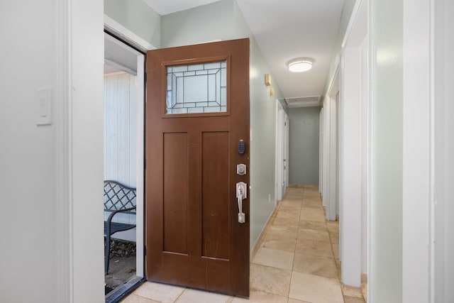 foyer entrance featuring light tile patterned floors