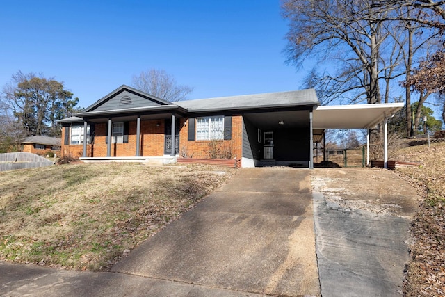 view of front facade with a carport