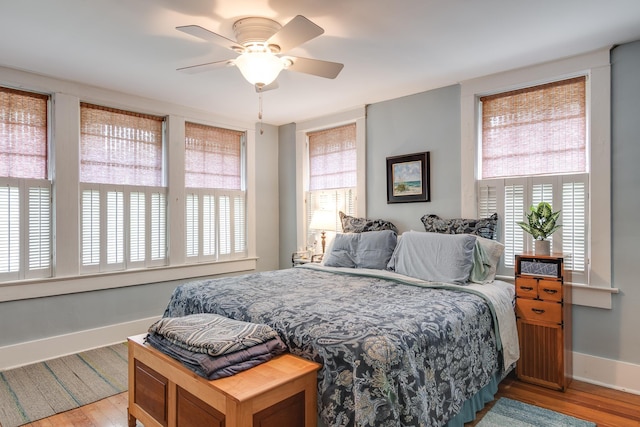 bedroom featuring ceiling fan and light wood-type flooring