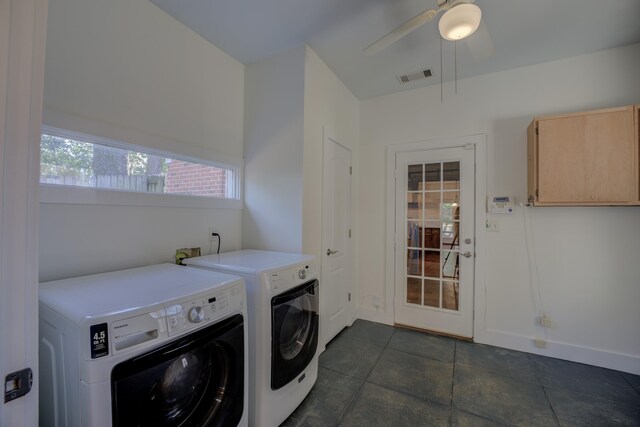 laundry room featuring ceiling fan and separate washer and dryer