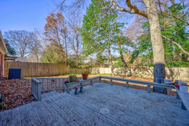 wooden deck with central air condition unit