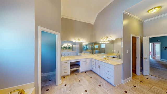 full bathroom with baseboards, vanity, a towering ceiling, and crown molding