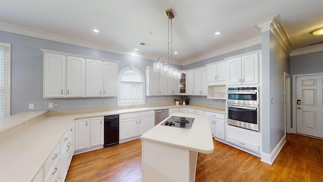 kitchen featuring appliances with stainless steel finishes, white cabinetry, and light wood-style flooring