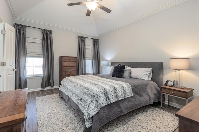 bedroom featuring ceiling fan, crown molding, and lofted ceiling