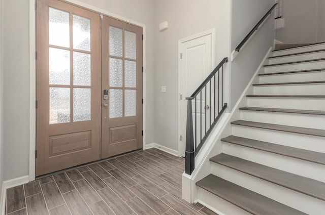 entrance foyer featuring french doors