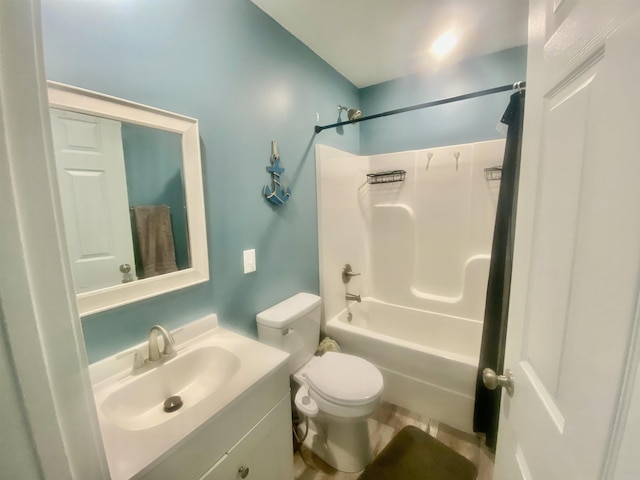 full bathroom featuring toilet, bathtub / shower combination, and vanity