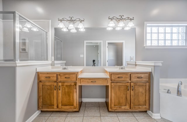 bathroom with vanity, tile patterned floors, and shower with separate bathtub