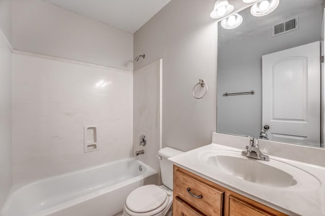 full bathroom featuring toilet, vanity, and washtub / shower combination