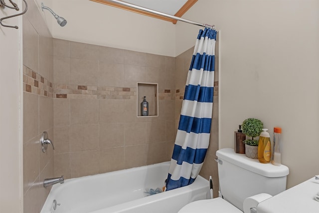 bathroom with toilet and shower / tub combo with curtain