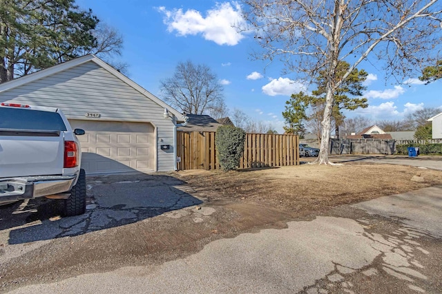 view of home's exterior featuring a garage