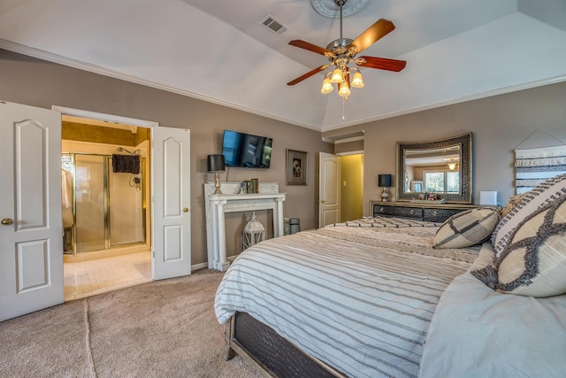 bedroom featuring ceiling fan, vaulted ceiling, carpet, and crown molding