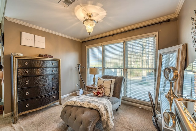 sitting room featuring light colored carpet and crown molding