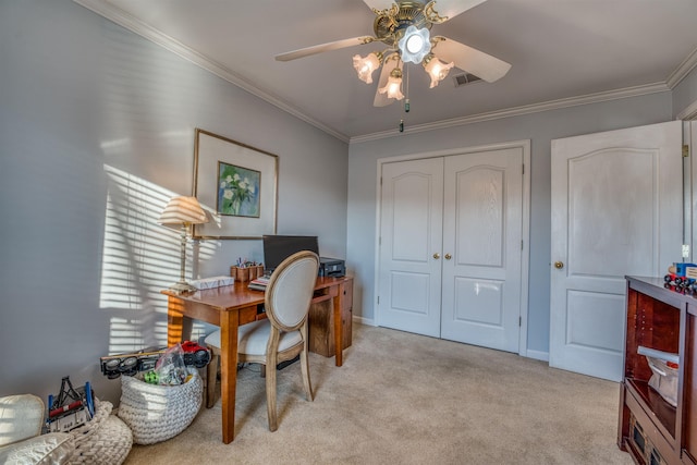 office space featuring ceiling fan, light colored carpet, and crown molding