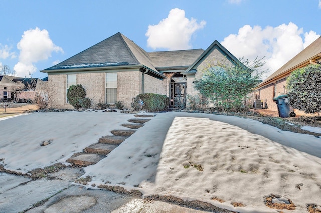 view of front of home featuring central AC unit