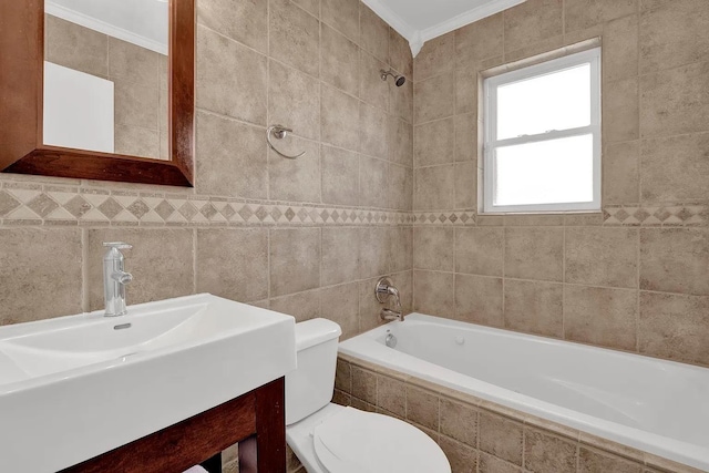 full bathroom with tiled shower / bath combo, vanity, tile walls, toilet, and ornamental molding