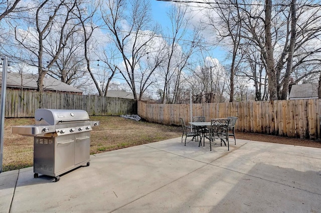 view of patio featuring a grill