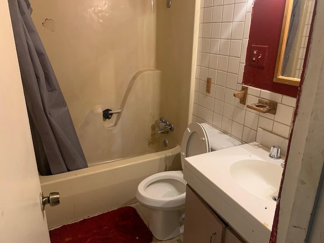 full bathroom with toilet, vanity, tile walls, decorative backsplash, and shower / bath combination with curtain